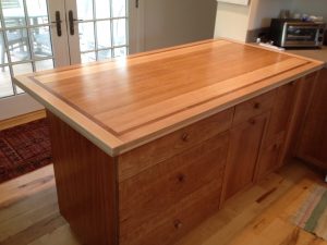 Incorporating Reclaimed Red Oak Ceiling Joists in Butcher Block Counter and Reclaimed Chestnut (from the Home’s Original 19th Century Sub Floor) in Pantry Cabinet Doors
