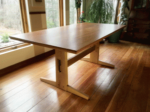 Kigumi Is the Japanese word for interlocking joints, held together without glues and hardware. This table was brought to its final destination in full finished pieces and then assembled on site with pegs and tenons during a dinner party. 
Note: Preassembled pieces did include the use of glue.